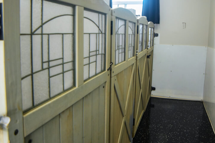 Wooden stall doors in a barn interior